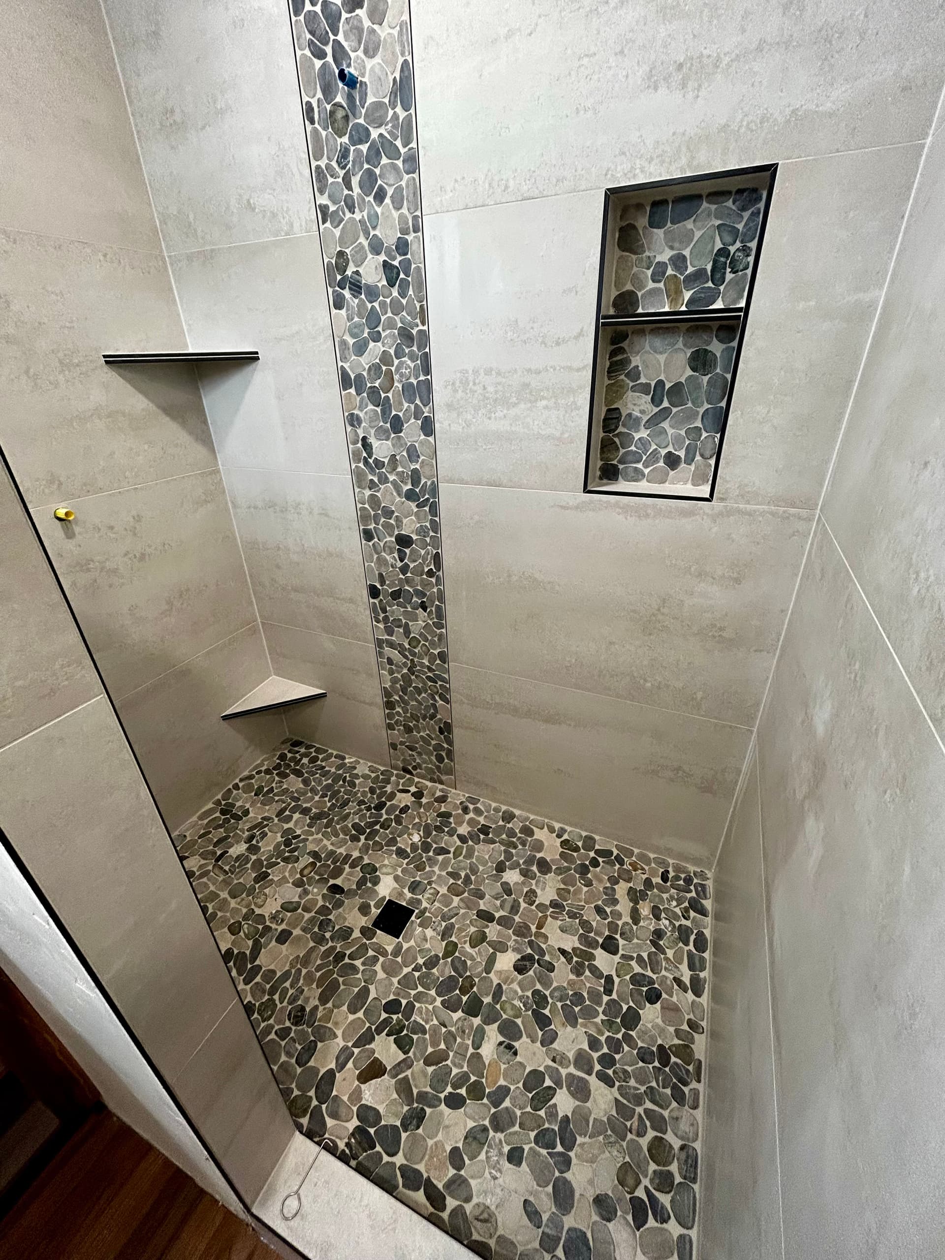 Gallery photos for Custom Tile Shower With Pebble Accents That Actually Stand Out: Image #1