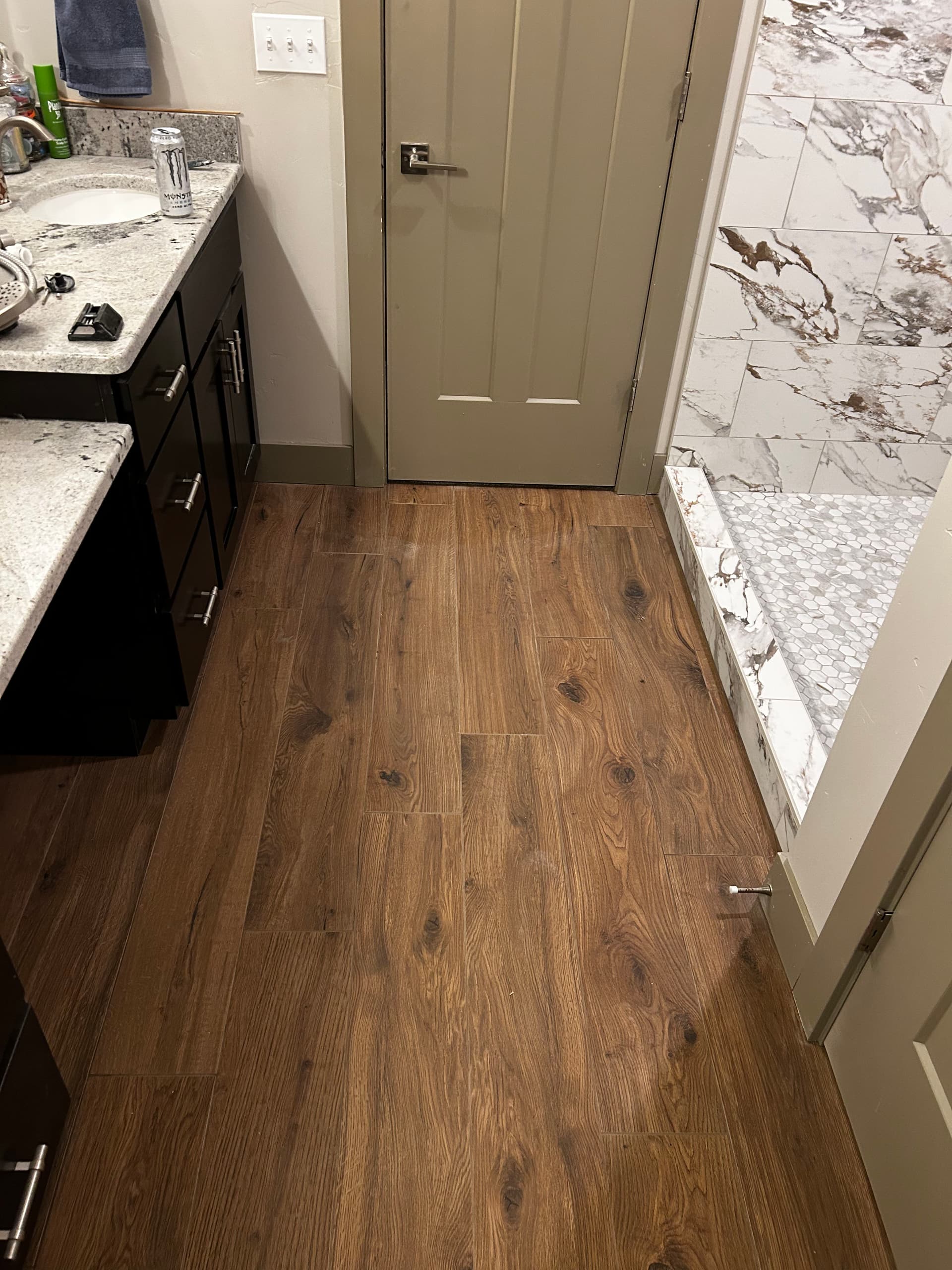 Gallery photos for Bathroom Makeover with Marble-Patterned Tiles and Custom Features: Image #2